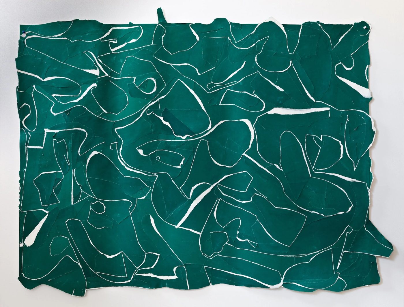 Green torn-paper composition by Sonia Stanyard, shown in her Camberwell Arts profile